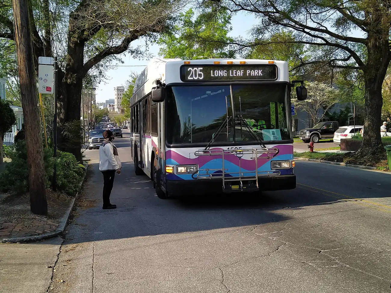 A Wave Transit Route 205 bus stops for a rider on South Front Street in Wilmington