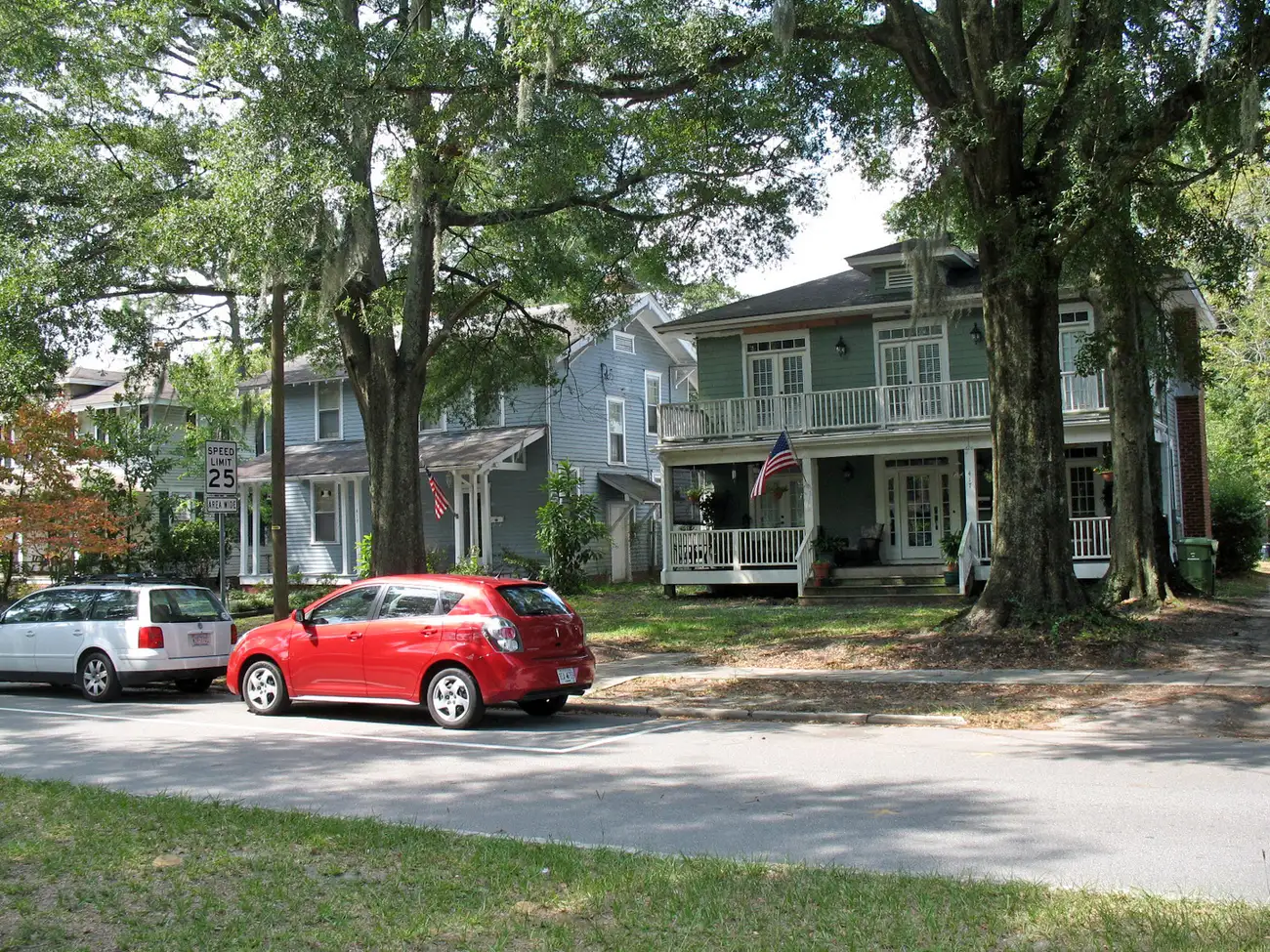 Two-story houses under live oaks in the Sunset Park Historic District in Wilmington