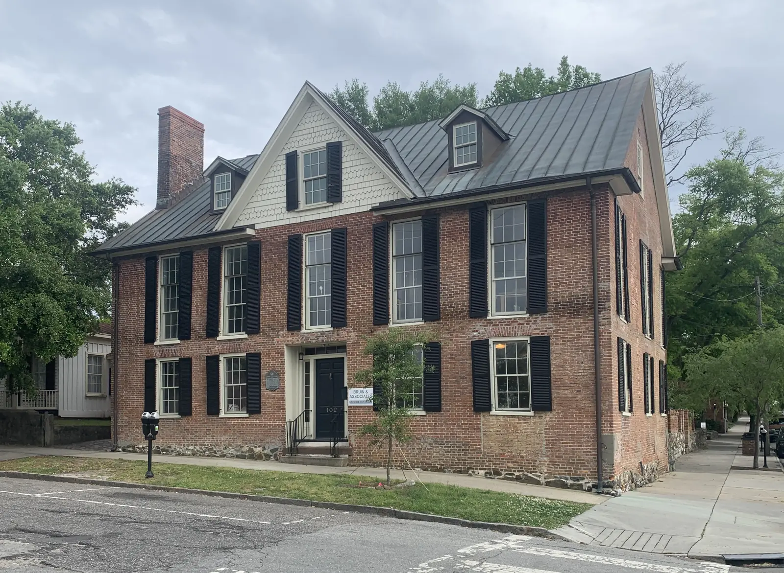 A three-story brick house at 102 Orange St. in downtown Wilmington.