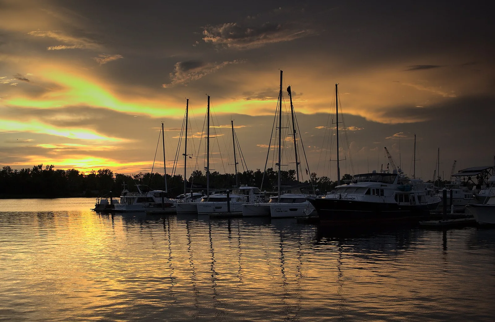 Sailboats and yachts at Port City Marina on the Cape Fear River in downtown Wilmington at sunset