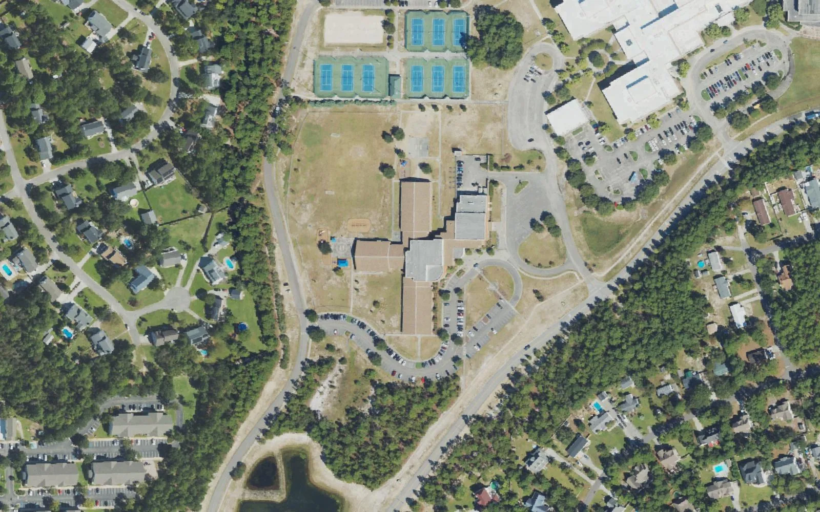 Edwin A. Anderson Elementary School off Halyburton Memorial Parkway, seen from the air, with the tennis courts and buildings of its neighboring schools to the north