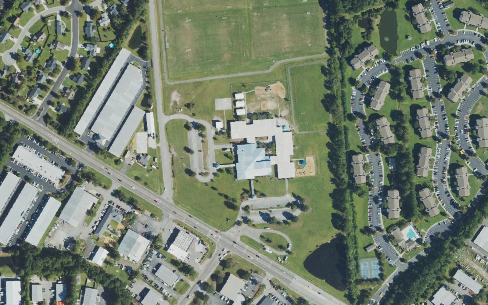 Dr. Hubert Eaton Sr. Elementary School and its fields off Gordon Road, seen from the air, with apartments to the east