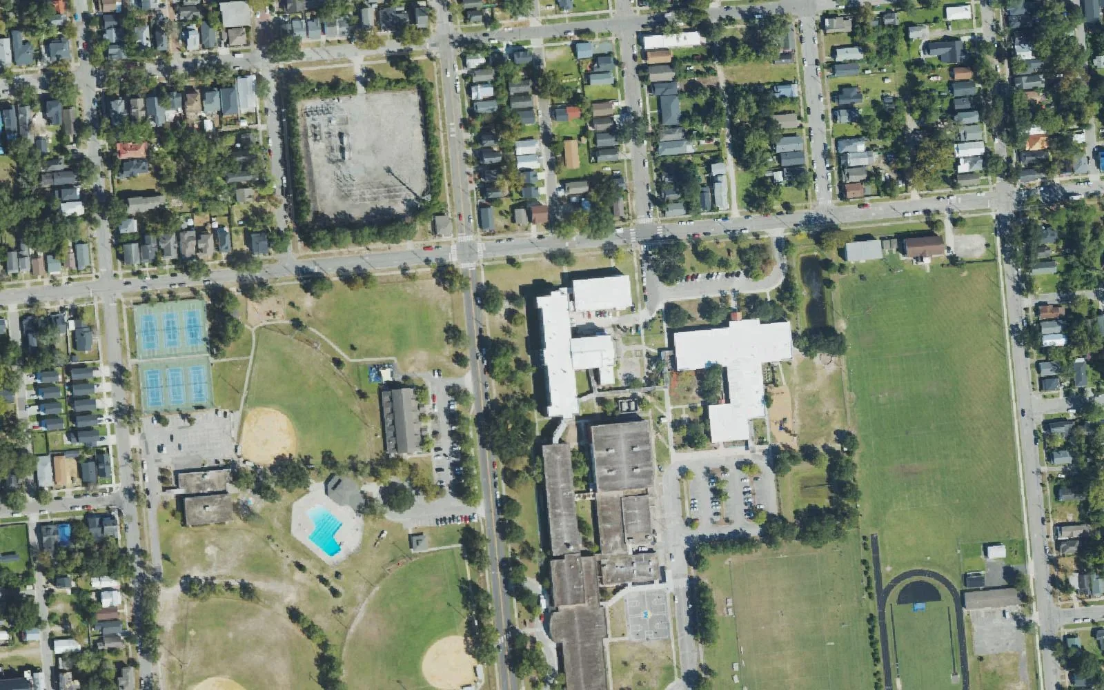 The International School at Gregory and neighboring school buildings and playing fields around Ann Street in Wilmington, seen from the air