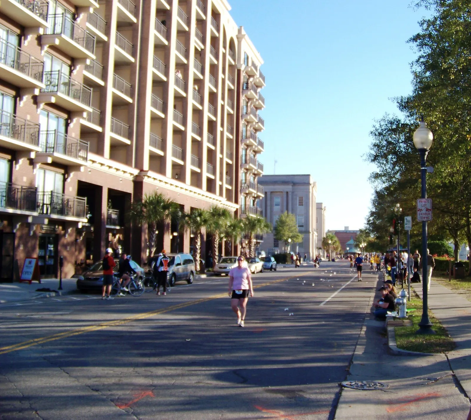 Runners on Water Street in downtown Wilmington during a Beach2Battleship triathlon.